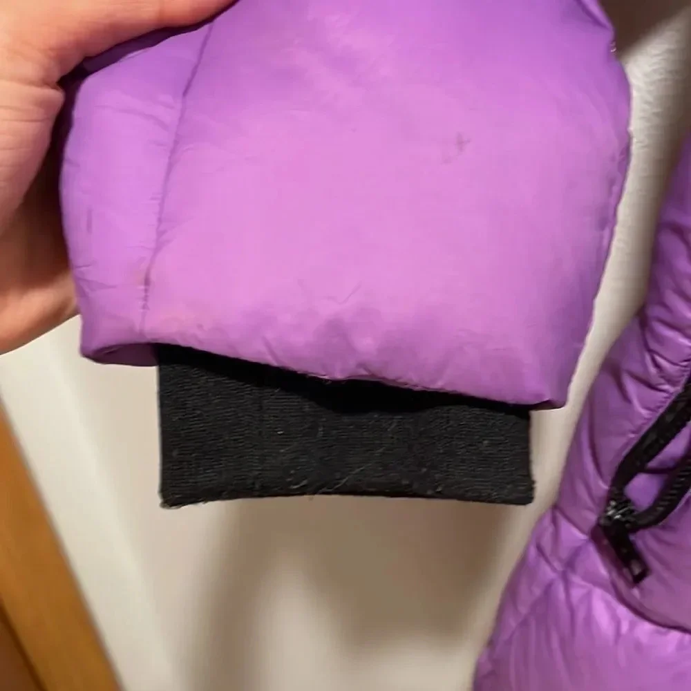 Orolay woman’s bright purple puffer trench jacket